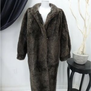 Beautiful reversible beaver fox mink coats in excellent condition now available.